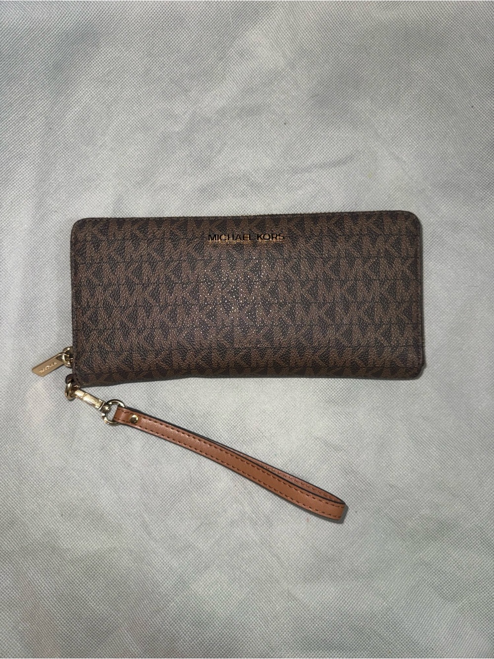 Michael Kors Brown Monogram Zip Wristlet with Tan Strap